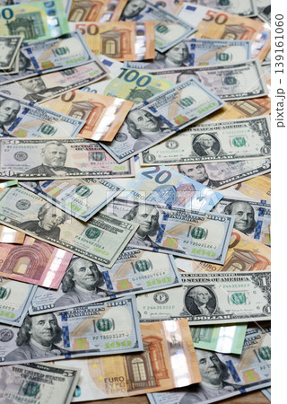 Euro and dollar banknotes, exchange, sales, economic tariffs and taxes. Euros and dollars 139161060