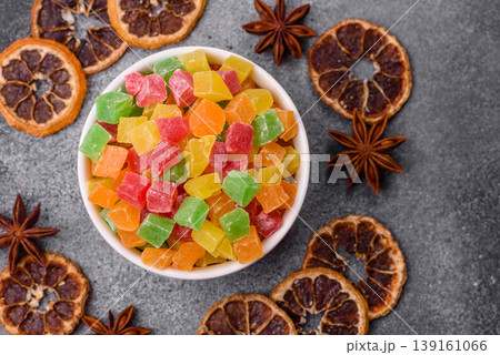 Candied fruit in colorful cubes as an ingredient for baked goods and sweets. Candied fruit Candied fruit in colorful cubes as an ingredient for baked goods and sweets. Candied fruit 139161066