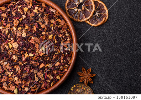 Dry herbal or fruit tea with flower petals and aromatic additives. Dry fruit herbal tea Dry herbal or fruit tea with flower petals and aromatic additives. Dry fruit herbal tea 139161097