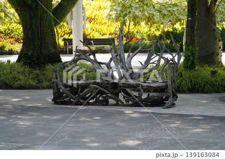 Wooden sculpture in a park nature scene Wooden sculpture in a park nature scene 139163084