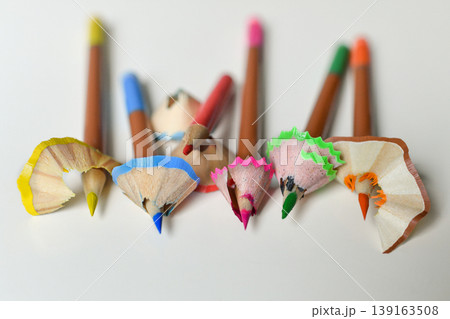 Row colored pencils with decorative shavings minimal back to school Row colored pencils with decorative shavings minimal back to school 139163508