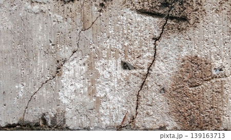 Cracked and Dull Concrete Wall Texture with Rough Details Cracked and Dull Concrete Wall Texture with Rough Details 139163713