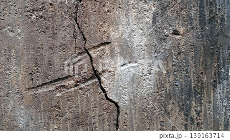 Cracked and Dull Concrete Wall Texture with Rough Details 139163714