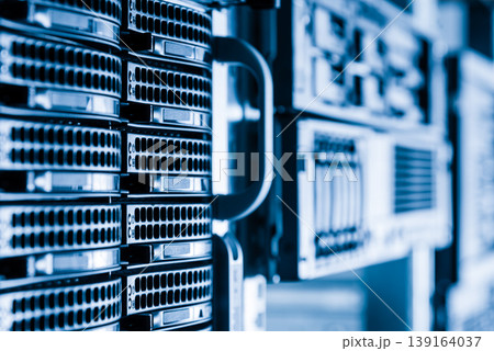 Cluster of data storage hard drives inside server room Cluster of data storage hard drives inside server room 139164037