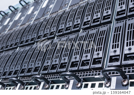 cluster of data storage SSD hard drives inside server rack cluster of data storage SSD hard drives inside server rack 139164047