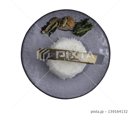 This composition celebrates the minimalist beauty of a traditional Japanese-inspired salmon donburi isolated on a white background with a clipping path. At its heart, a succulent fillet of 139164132