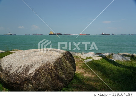 Ocean View with Rocks and Ships on the Horizon Ocean View with Rocks and Ships on the Horizon 139164187