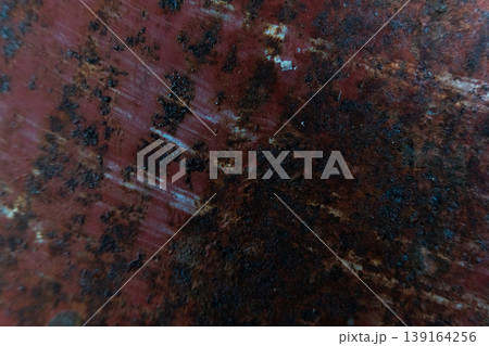 Weathered Red Metal Surface with Rust Texture 139164256