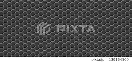 Closeup hexagonal raised tile pattern in deep gray metallic 139164509