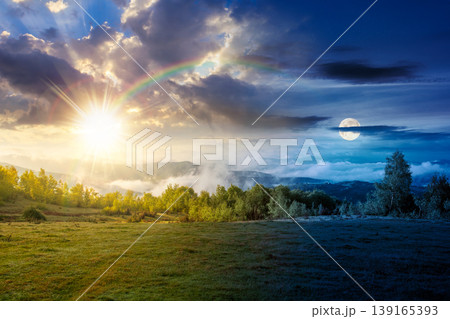 foggy carpathian mountain landscape. day meet night. outdoor adventure with stunning view in light at twilight. countryside landscape with rolling hills, fog and cloudy sky. harmony concept foggy carpathian mountain landscape. day meet night. outdoor adventure with stunning view in light at twilight. countryside landscape with rolling hills, fog and cloudy sky. harmony concept 139165393