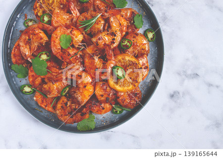grilled shrimp, unpeeled, headless, with spices, on a marble table, homemade, no people, grilled shrimp, unpeeled, headless, with spices, on a marble table, homemade, no people, 139165644