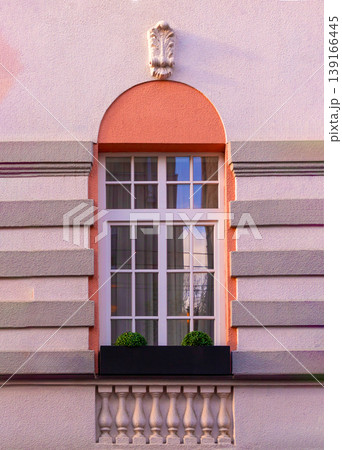 Retro closed window on facade 139166445