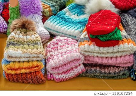Winter hats pile sold on market Winter hats pile sold on market 139167254