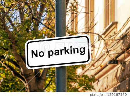 No parking sign on urban street No parking sign on urban street 139167320