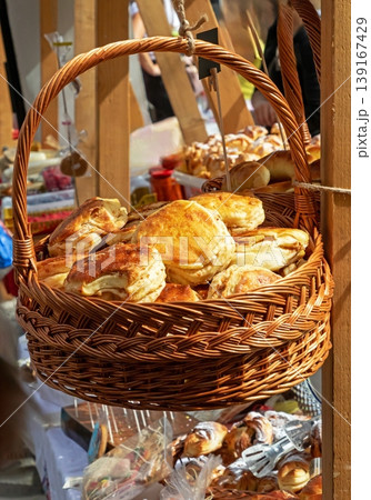 Savoury pastry in a basket sold on market Savoury pastry in a basket sold on market 139167429