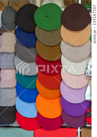 Colorful beret caps on market 139167587