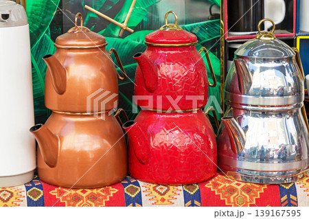 Retro metal kettles on market 139167595
