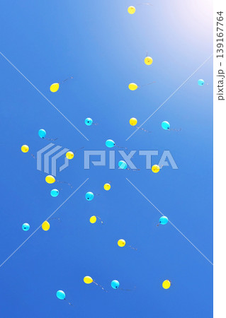 Blue and yellow balloons Blue and yellow balloons 139167764