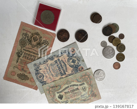 Coins and banknotes for numismatic collection display Coins and banknotes for numismatic collection display 139167817