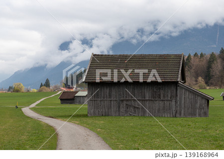 Rustic Barn Beside Alpine Path in Bavaria 139168964