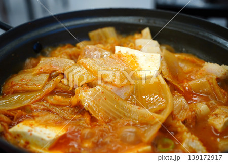 Traditional Korean Kimchi Stew with Pork and Tofu in a Hot Pot, Kimchi-jjigae Traditional Korean Kimchi Stew with Pork and Tofu in a Hot Pot, Kimchi-jjigae 139172917