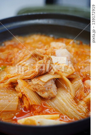 Traditional Korean Kimchi Stew with Pork and Tofu in a Hot Pot, Kimchi-jjigae Traditional Korean Kimchi Stew with Pork and Tofu in a Hot Pot, Kimchi-jjigae 139172919
