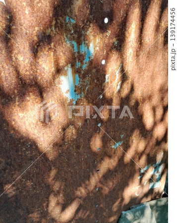 close up of a rough rusty metal surface 139174456