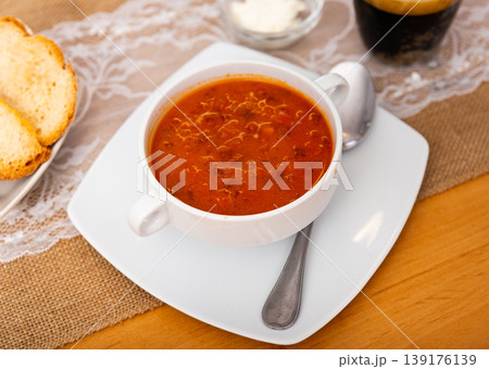 Borscht soup with beets served in bowl Borscht soup with beets served in bowl 139176139