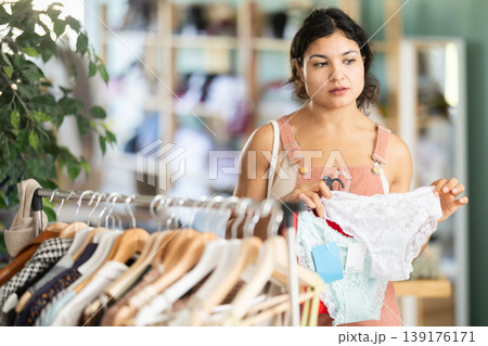 Girl at trading floor pick out and buying panties Girl at trading floor pick out and buying panties 139176171