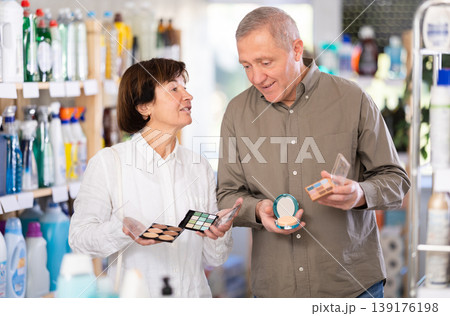 Couple man and woman choosing cosmetics in store 139176198