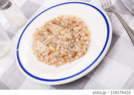Buckwheat porridge served on plate Buckwheat porridge served on plate 139176420