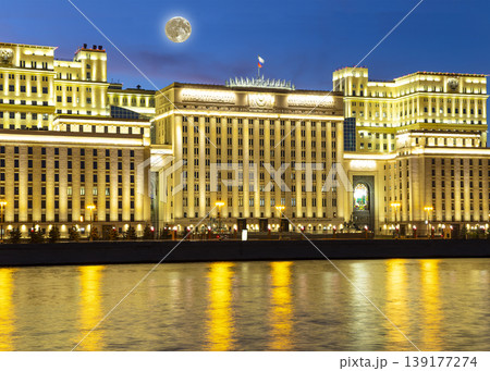 Main Building of the Ministry of Defence of the Russian Federation (Minoboron) -- inscription in Russian, at night (with the super moon) and Moskva River. Moscow, Russia Main Building of the Ministry of Defence of the Russian Federation (Minoboron) -- inscription in Russian, at night (with the super moon) and Moskva River. Moscow, Russia 139177274