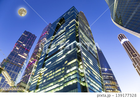 Skyscrapers International Business Center (City) at night with the super moon, Moscow, Russia Skyscrapers International Business Center (City) at night with the super moon, Moscow, Russia 139177328