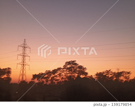 high voltage pole at sunset high voltage pole at sunset 139179854