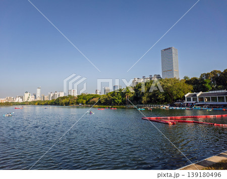 Kayakers Enjoying a Scenic Day at Nanhu Lake in Nanning, China Kayakers Enjoying a Scenic Day at Nanhu Lake in Nanning, China 139180496