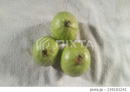 Top View of Grouped Fresh Green Guavas Top View of Grouped Fresh Green Guavas 139181241