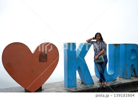 Young Indian Woman Posing Beside The I Love Kurseong Sign In West Bengal 139181604