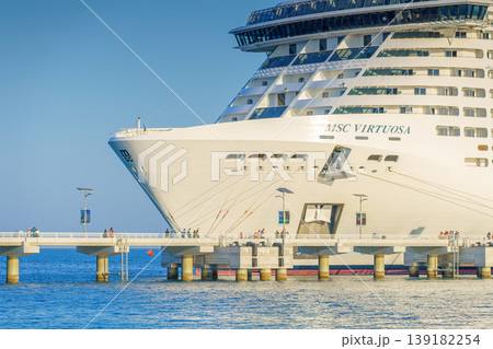Sir Bani Yas island, United Arab Emirates - Jan 11 2024, Panoramic view of the MSC Virtuosa cruise ship in the foreground, Sir Bani Yas, Abu Dhabi, United Arab Emirates Sir Bani Yas island, United Arab Emirates - Jan 11 2024, Panoramic view of the MSC Virtuosa cruise ship in the foreground, Sir Bani Yas, Abu Dhabi, United Arab Emirates 139182254