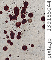 Reddish brown Splatters Across a Textured Grey Surface Artistic Impression of Spills or Stains 139185044