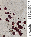 Reddish Brown Splatters on a Worn Concrete Surface Emotional Tone Commercial Applications 139185047