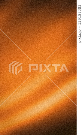 Rich vertical abstract background with a deep orange and dark brown gradient, highlighted by bright light streaks and an authentic, high-quality grainy texture 139185383