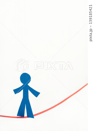 Balancing Act A Paper Cutout on a Tightrope Balancing Act A Paper Cutout on a Tightrope 139185421
