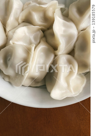 chinese dumplings on a plate	 139185579