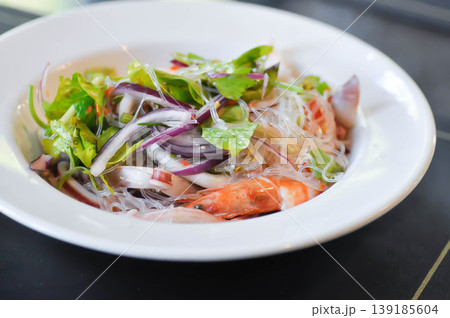 spicy salad or noodles salad, Thai spicy salad or vermicelli and seafood salad or vermicelli salad or grass noodles salad 139185604