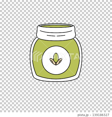 Simple jar holds vibrant green paste 139186327