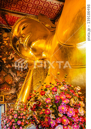 The Big golden Reclining Buddha within Wat Pho is the important in Bangkok, Thailand 139186498