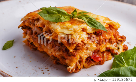 Traditional lasagna made with minced beef bolognese sauce Traditional lasagna made with minced beef bolognese sauce 139186673