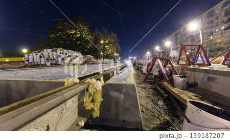 Road construction site with tram tracks repair and maintenance timelapse hyperlapse. Road construction site with tram tracks repair and maintenance timelapse hyperlapse. 139187207