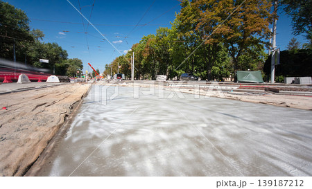 Road construction site with tram tracks repair and maintenance timelapse hyperlapse. Road construction site with tram tracks repair and maintenance timelapse hyperlapse. 139187212