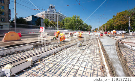 Road construction site with tram tracks repair and maintenance timelapse hyperlapse. Road construction site with tram tracks repair and maintenance timelapse hyperlapse. 139187213
